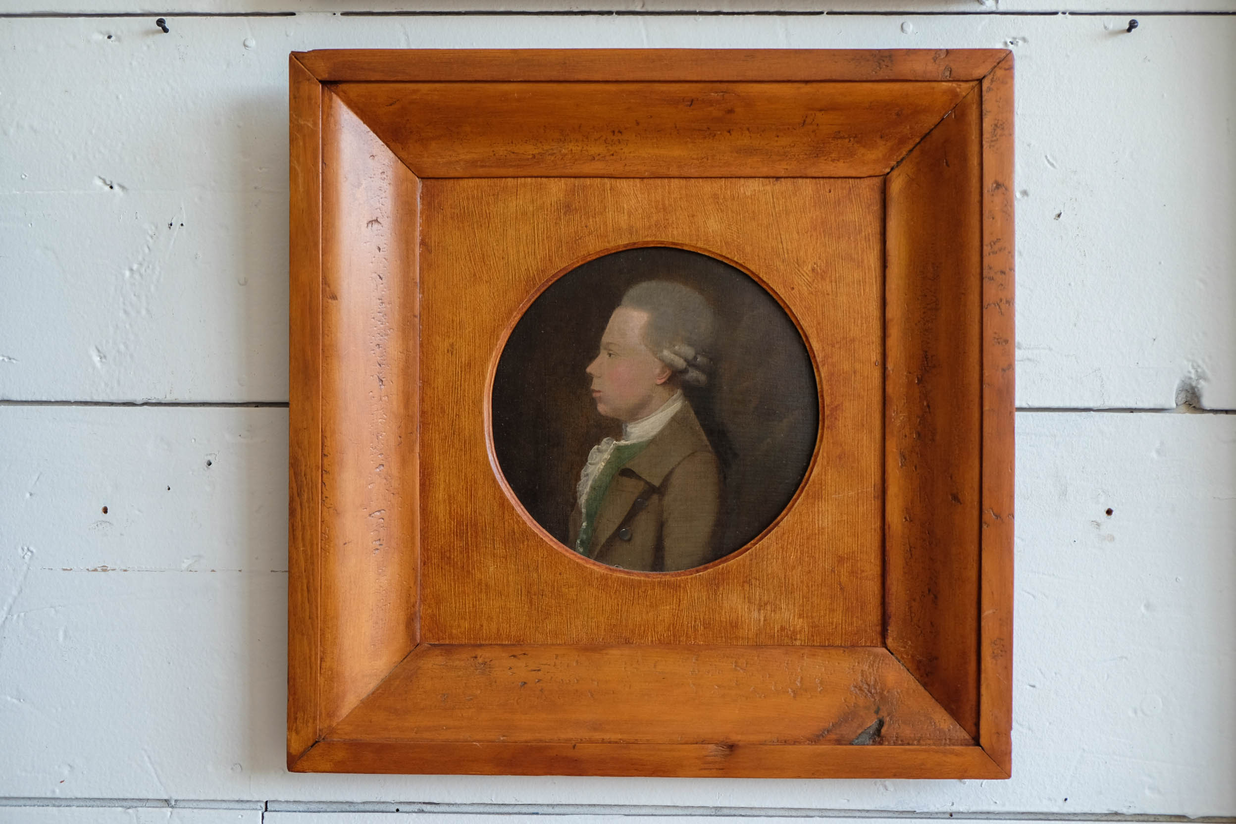 Antique profile painting with a wooden frame