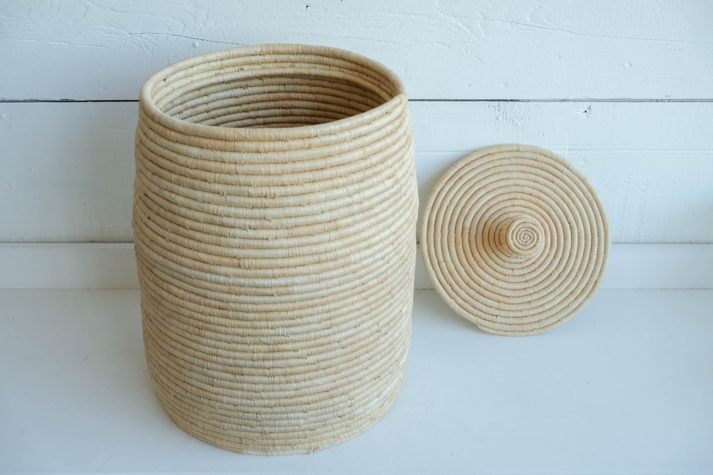 Raffia lidded basket